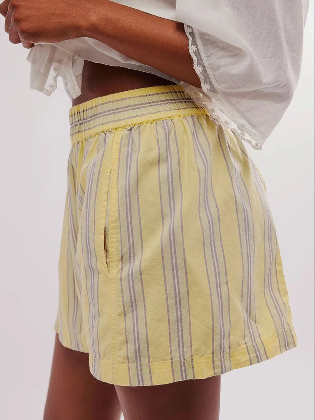 Elastic waist shorts with pockets.