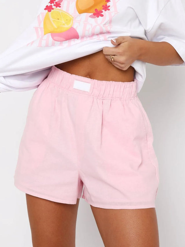 Elastic waist shorts with pockets.
