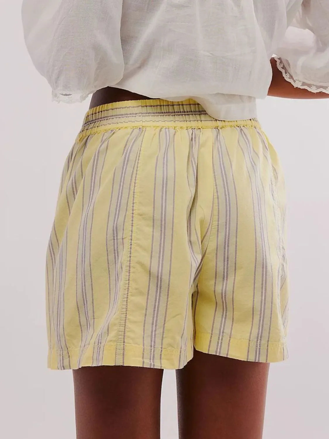 Elastic waist shorts with pockets.