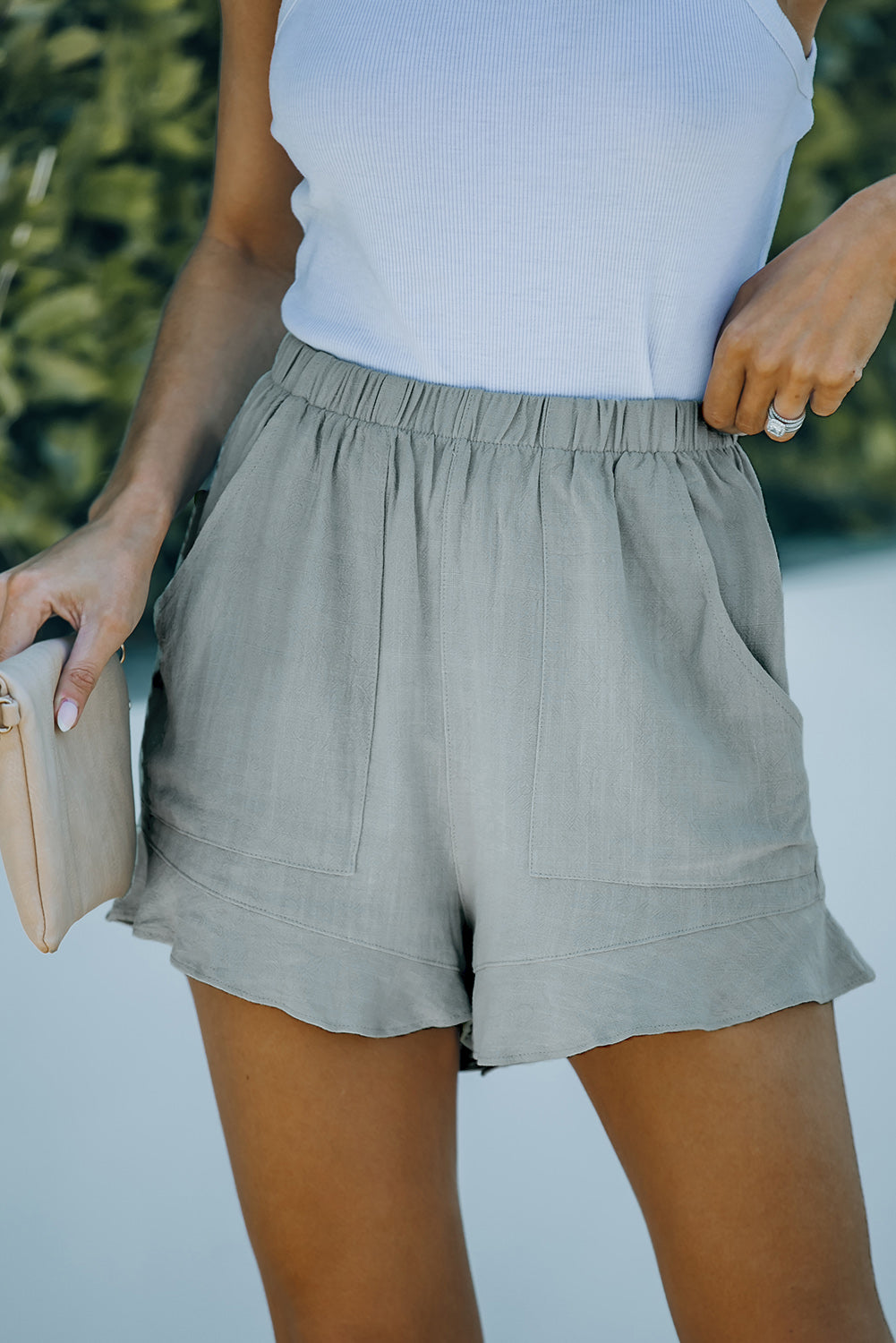 Elastic waist shorts with pockets.