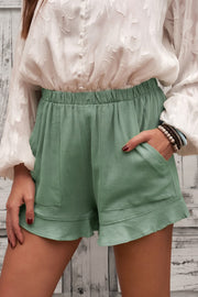 Elastic waist shorts with pockets.