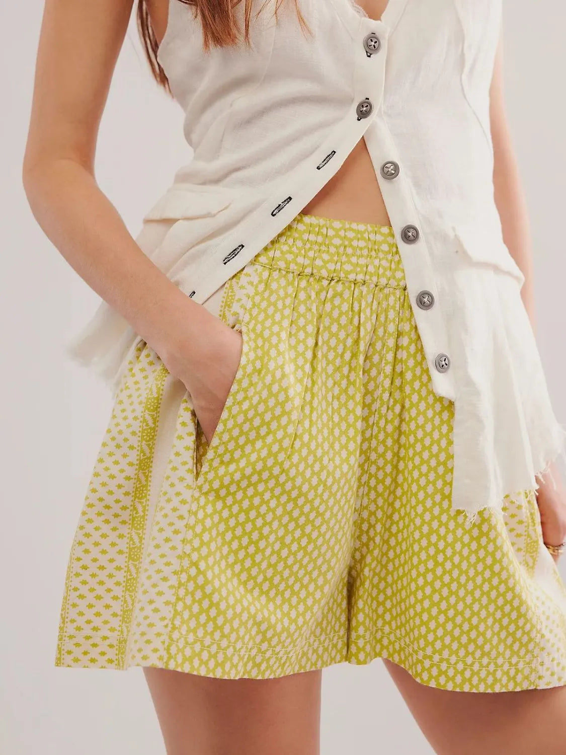 Elastic waist shorts with pockets.