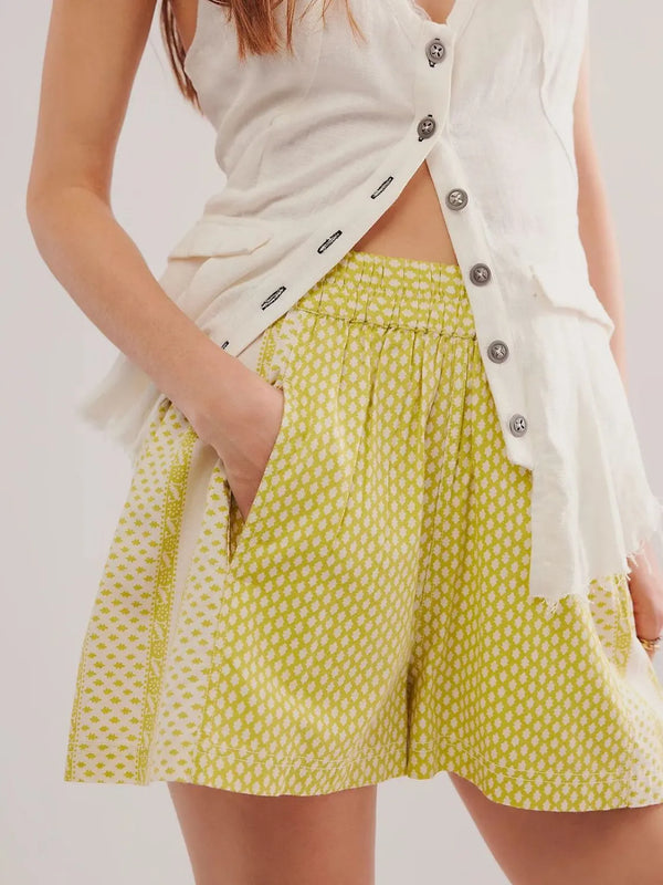Elastic waist shorts with pockets.