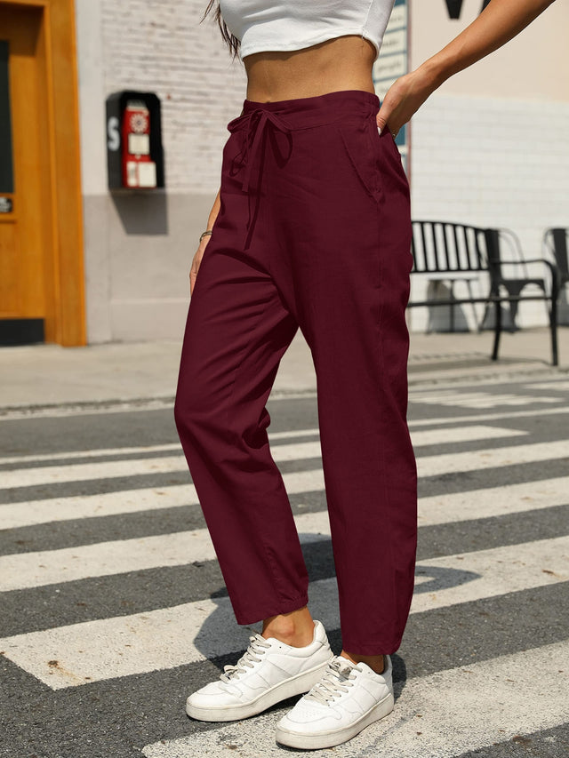 Elastic waist tapered pants, opaque.