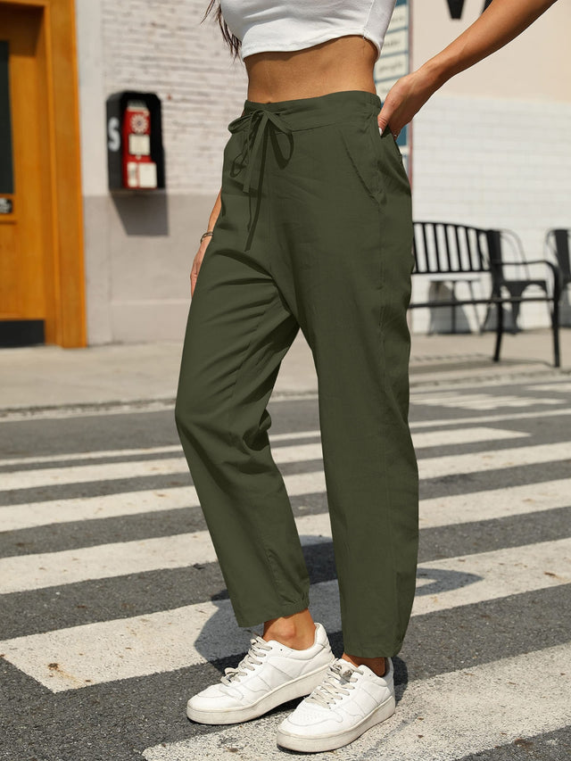 Elastic waist tapered pants, opaque.