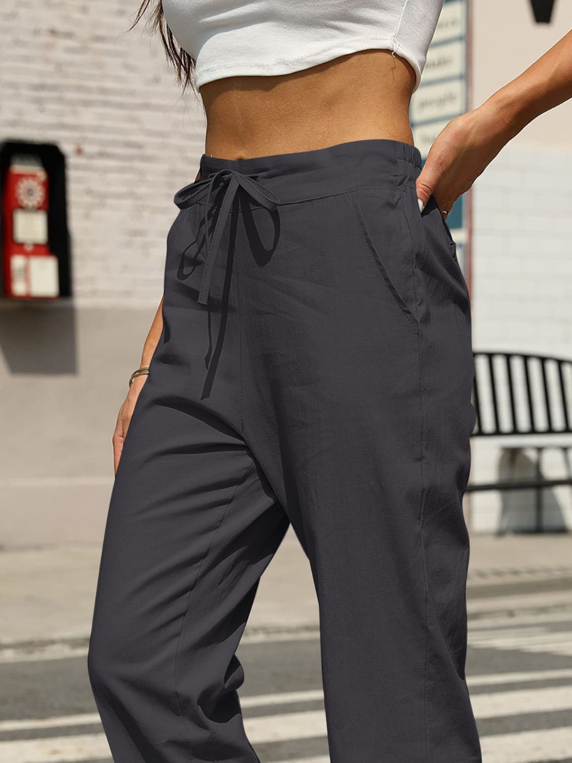 Elastic waist tapered pants, opaque.