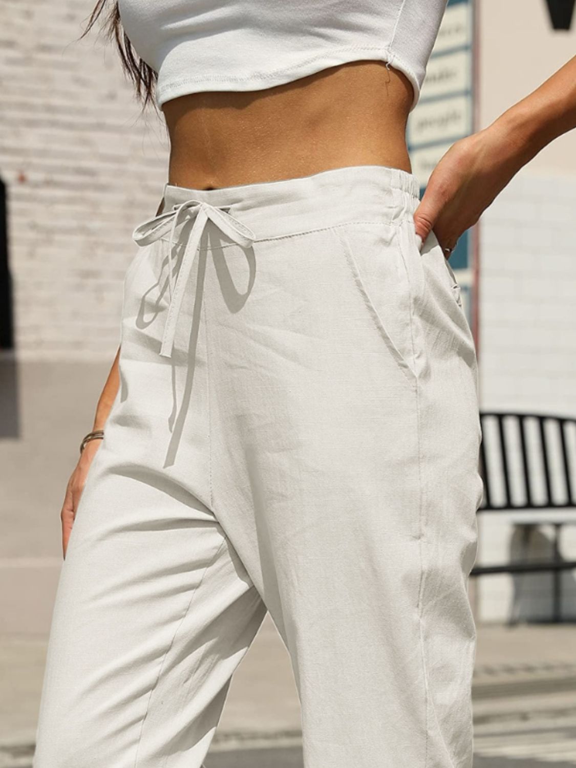 Elastic waist tapered pants, opaque.