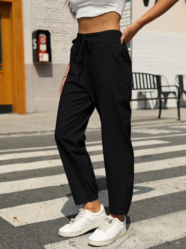 Elastic waist tapered pants, opaque.