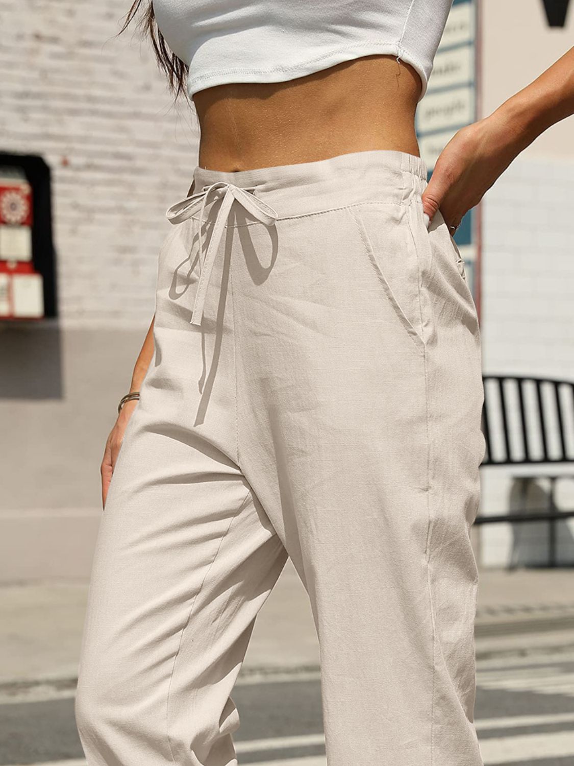 Elastic waist tapered pants, opaque.