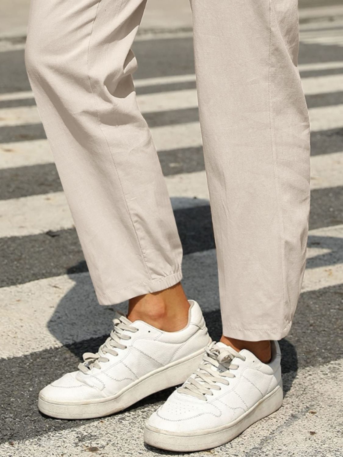 Elastic waist tapered pants, opaque.