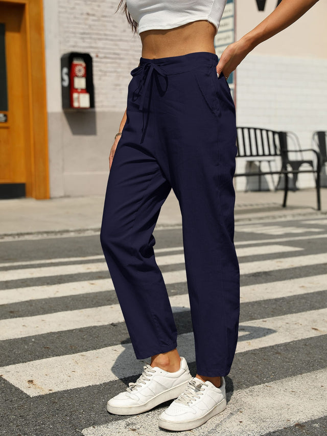 Elastic waist tapered pants, opaque.