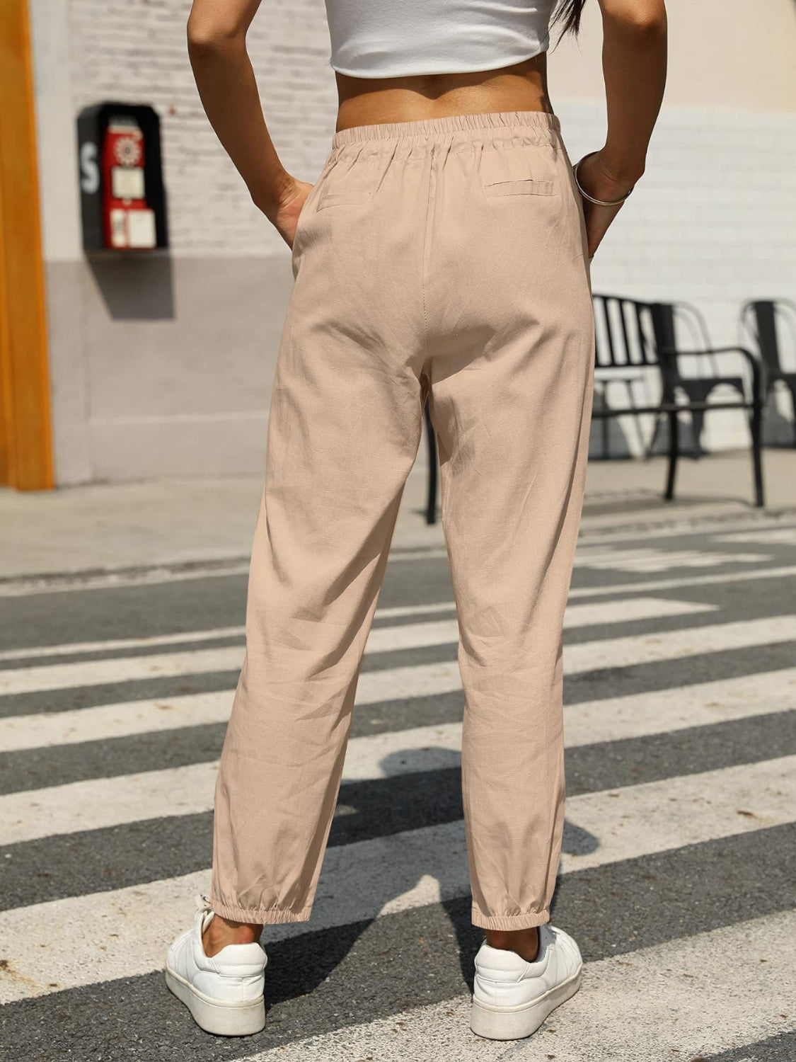 Elastic waist tapered pants, opaque.