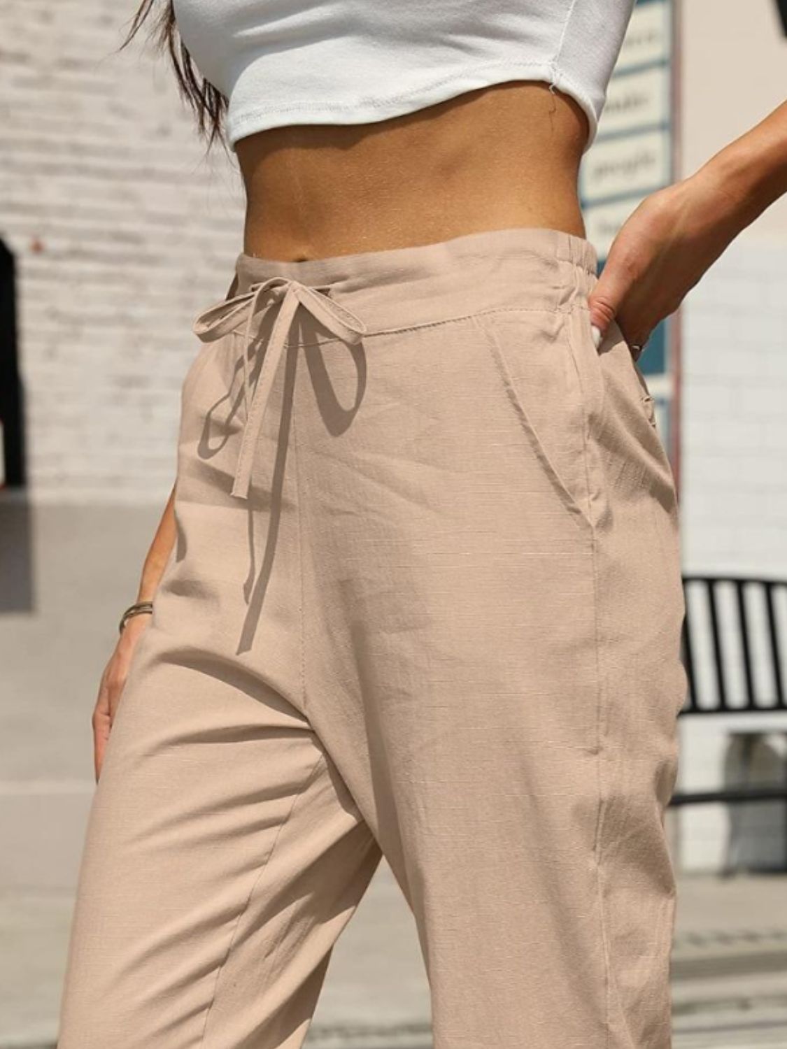 Elastic waist tapered pants, opaque.