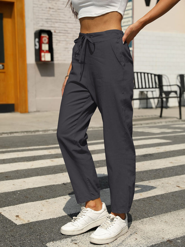Elastic waist tapered pants, opaque.