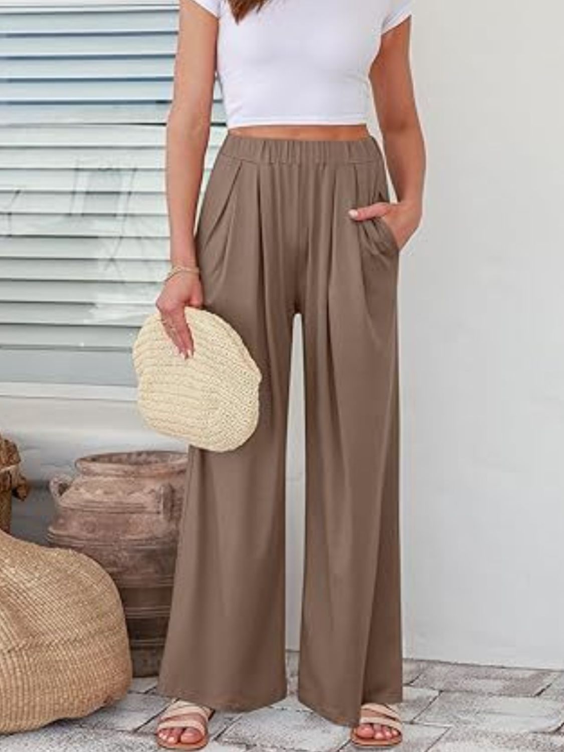 Elastic waist wide leg pants with pockets, opaque.