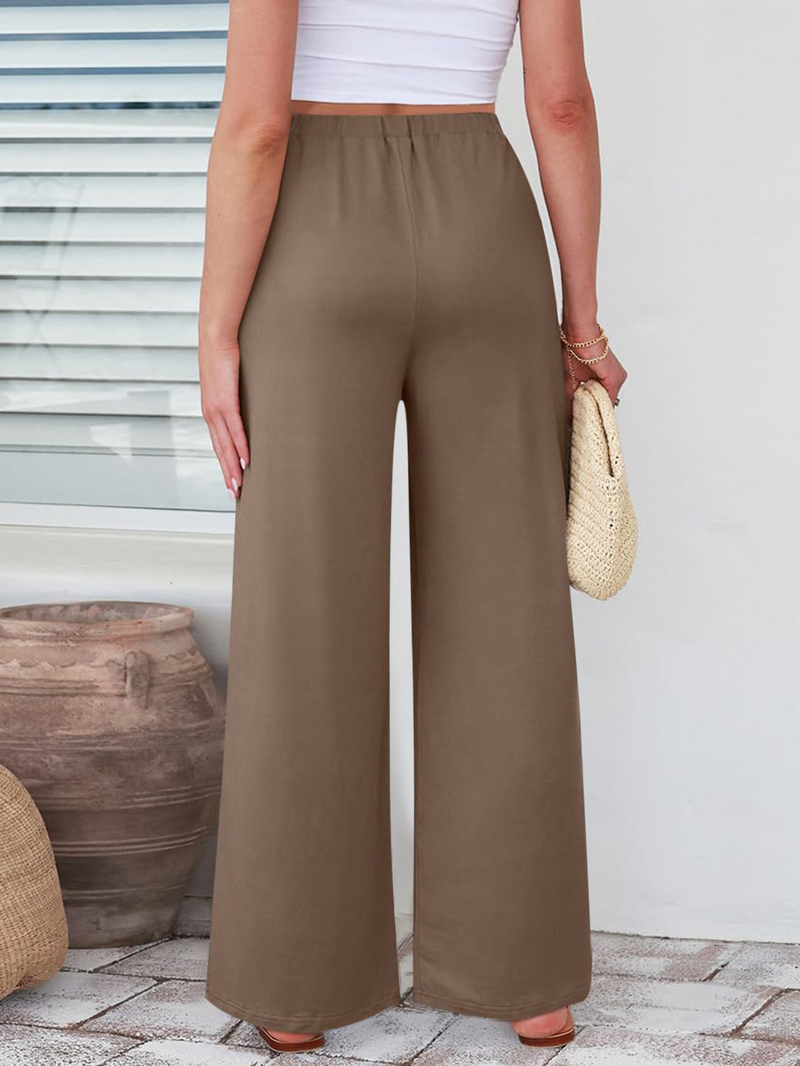 Elastic waist wide leg pants, opaque.