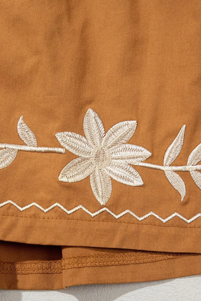 Embroidered boho tasseled drawstring elastic waist casual shorts.