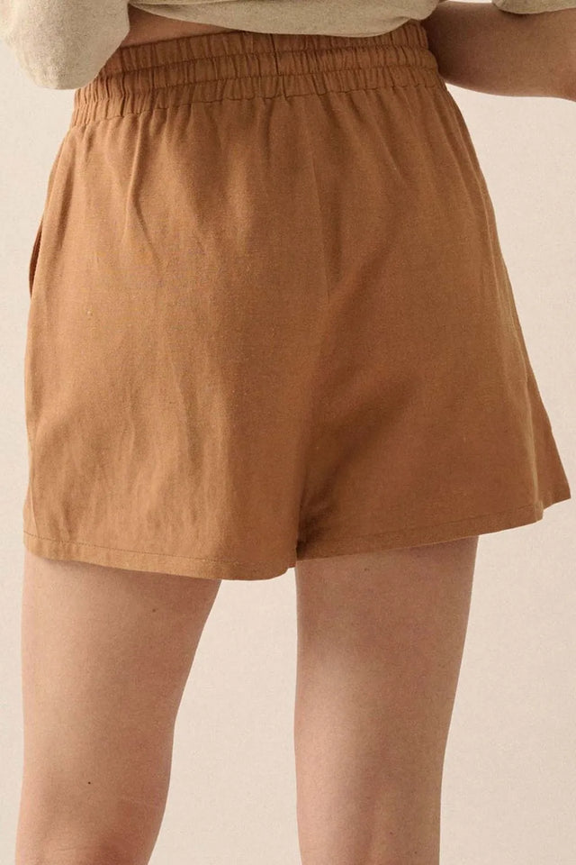 Embroidered boho tasseled drawstring elastic waist casual shorts.