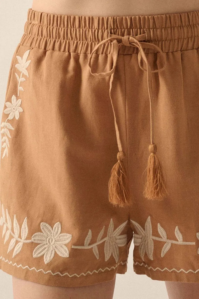 Embroidered boho tasseled drawstring elastic waist casual shorts.
