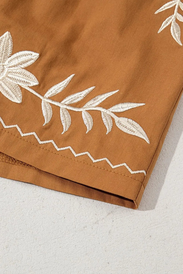 Embroidered boho tasseled drawstring elastic waist casual shorts.