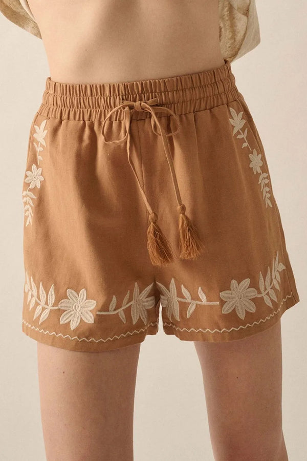 Embroidered boho tasseled drawstring elastic waist casual shorts.