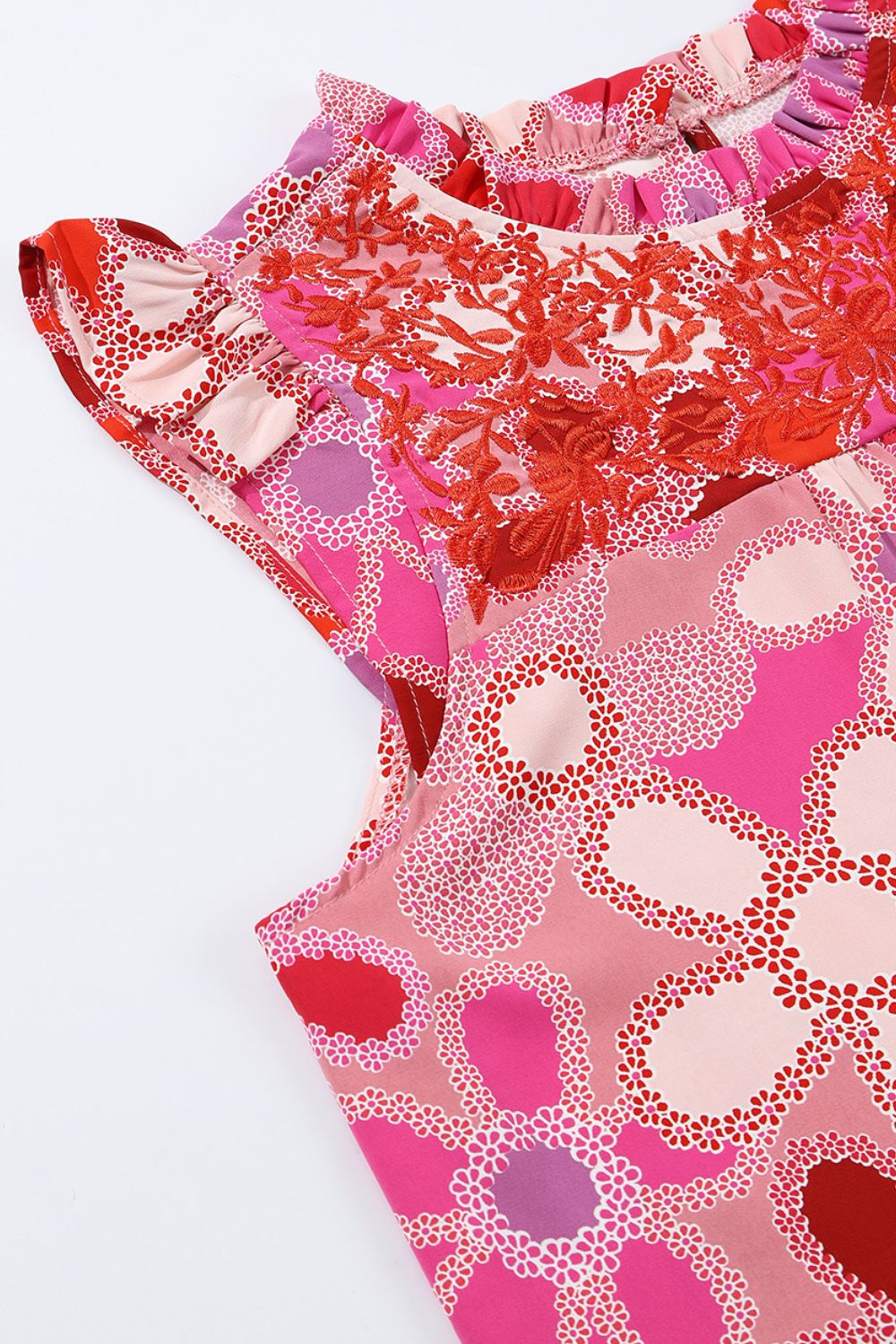 Embroidered detail floral ruffle cap sleeve blouse with frill.