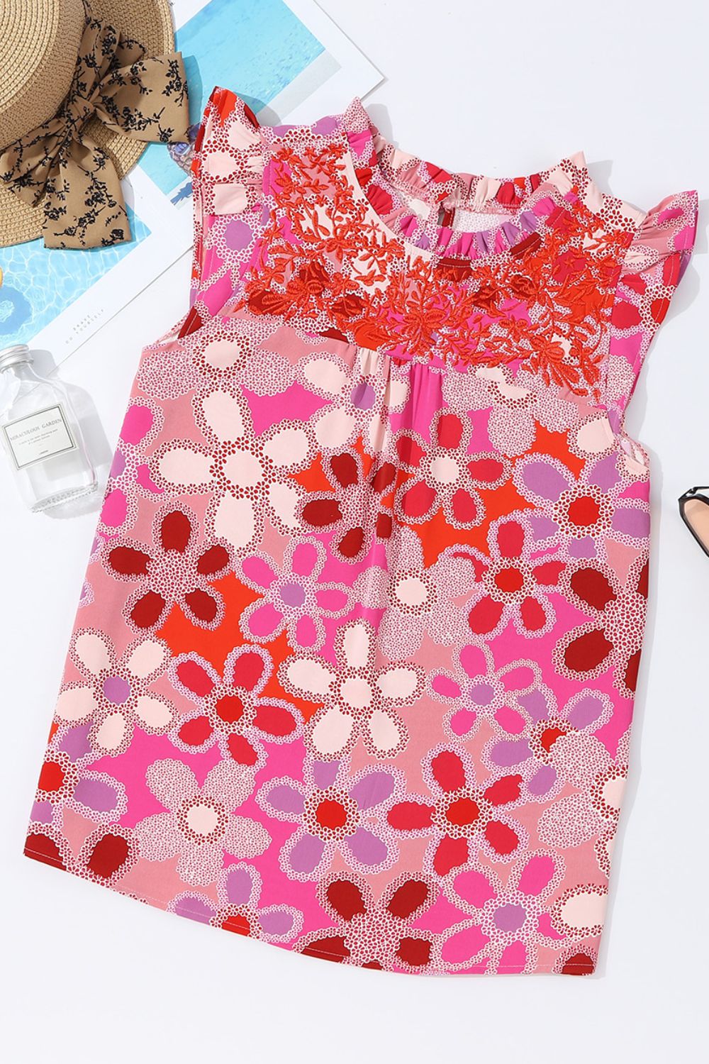 Embroidered detail floral ruffle cap sleeve blouse with frill.