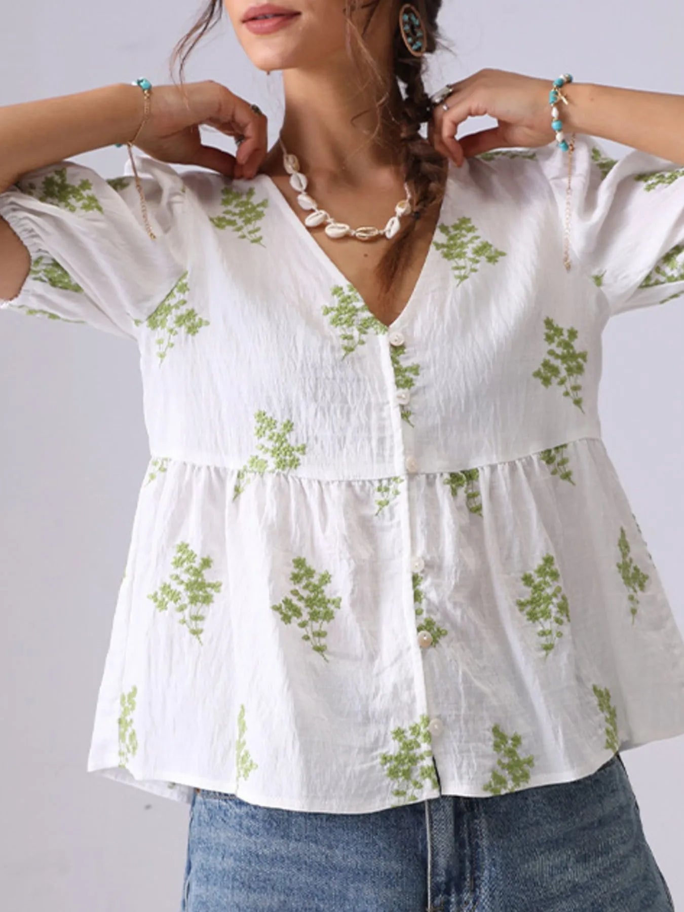 Embroidered V-Neck Puff Sleeve Peplum Blouse.