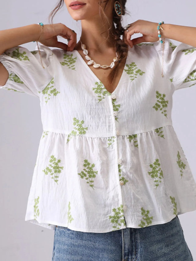 Embroidered V-Neck Puff Sleeve Peplum Blouse.