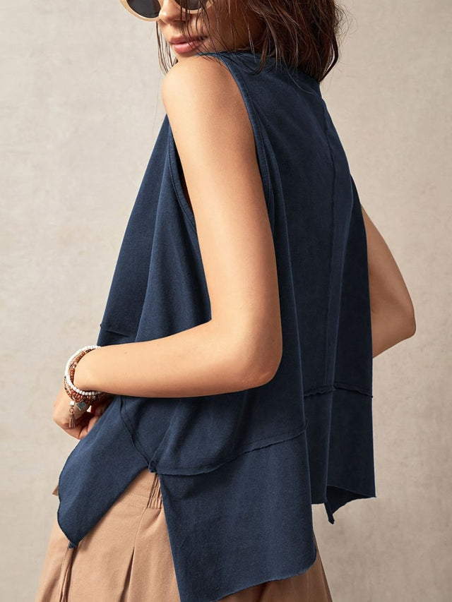 Exposed seam side slit round neck tank, opaque and slightly stretchy.