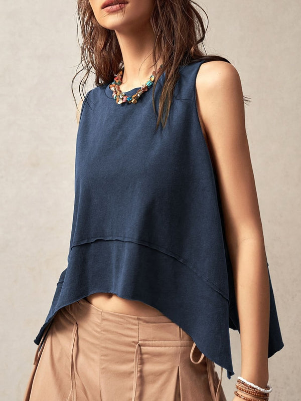 Exposed seam side slit round neck tank, opaque and slightly stretchy.