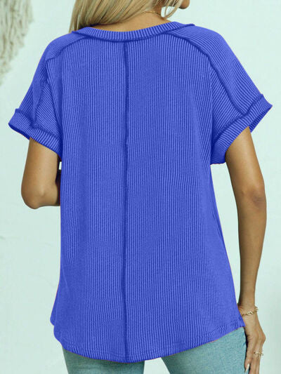 Exposed seam V-neck short sleeve top.