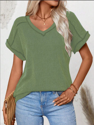 Exposed seam V-neck short sleeve top.