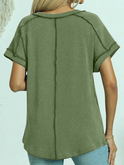 Exposed seam V-neck short sleeve top.