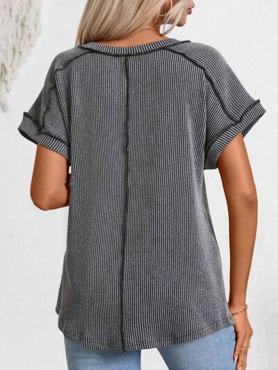 Exposed seam V-neck short sleeve top.