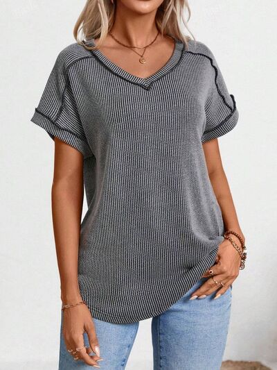 Exposed seam V-neck short sleeve top.