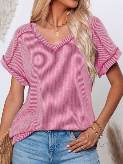 Exposed seam V-neck short sleeve top.