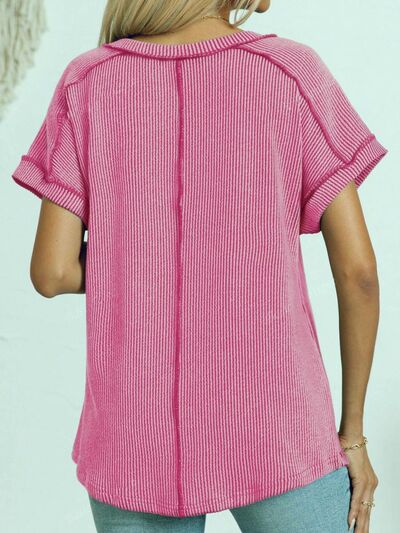 Exposed seam V-neck short sleeve top.