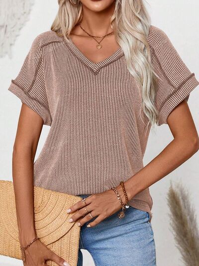Exposed seam V-neck short sleeve top.