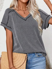 Exposed seam V-neck short sleeve top.