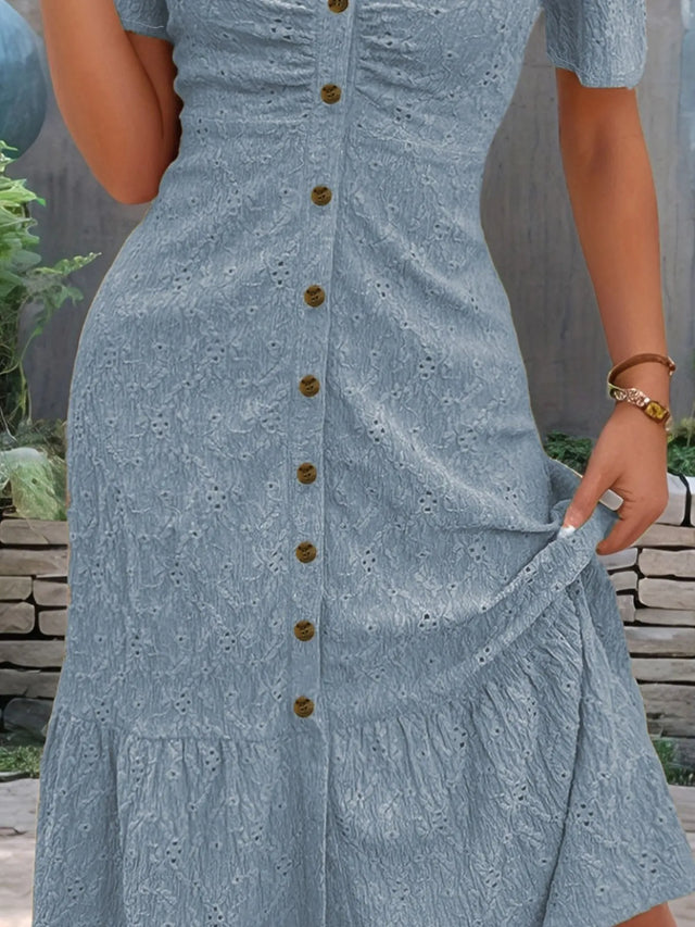Eyelet Button Front V-Neck Midi Dress with Ruffled Puff Sleeves.