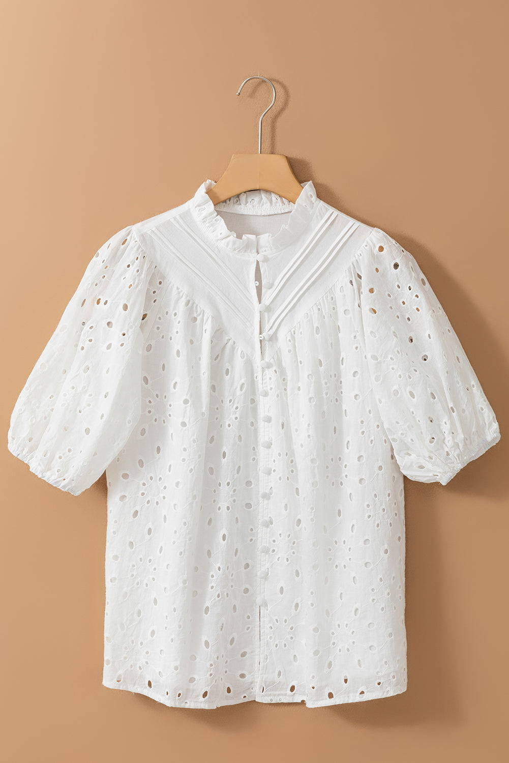Eyelet button-up half sleeve blouse.