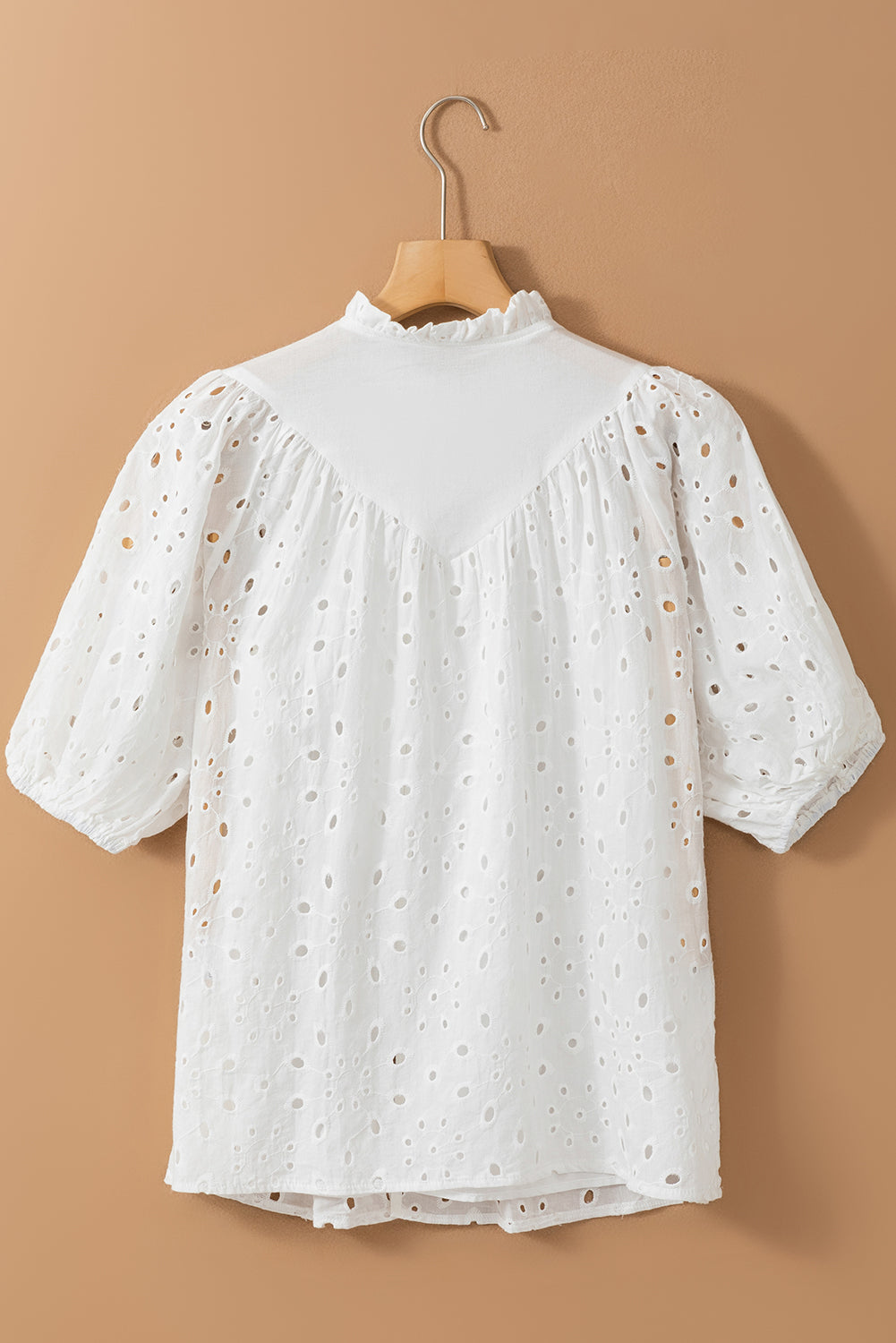 Eyelet button-up half sleeve blouse.