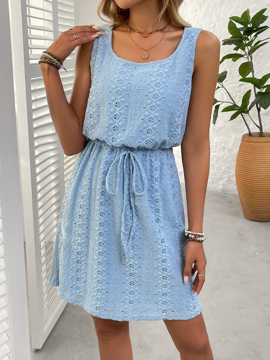 Eyelet Drawstring Round Neck Sleeveless Dress.