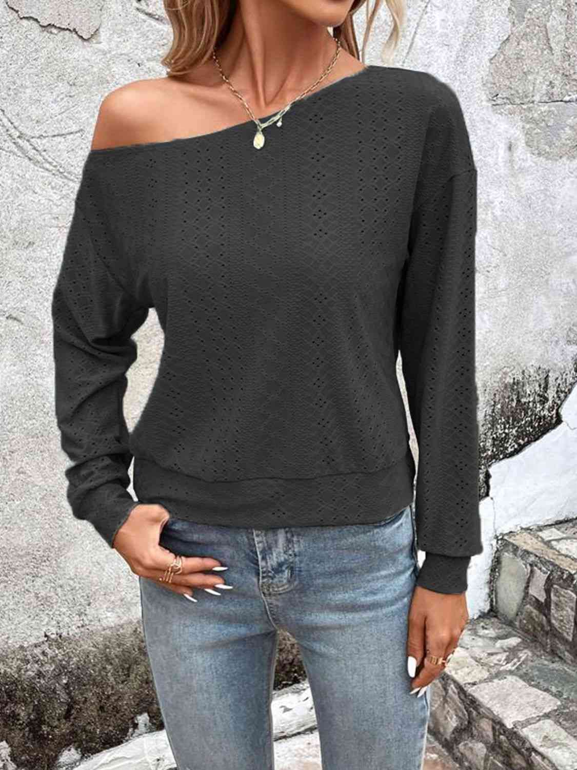 Eyelet dropped shoulder blouse.