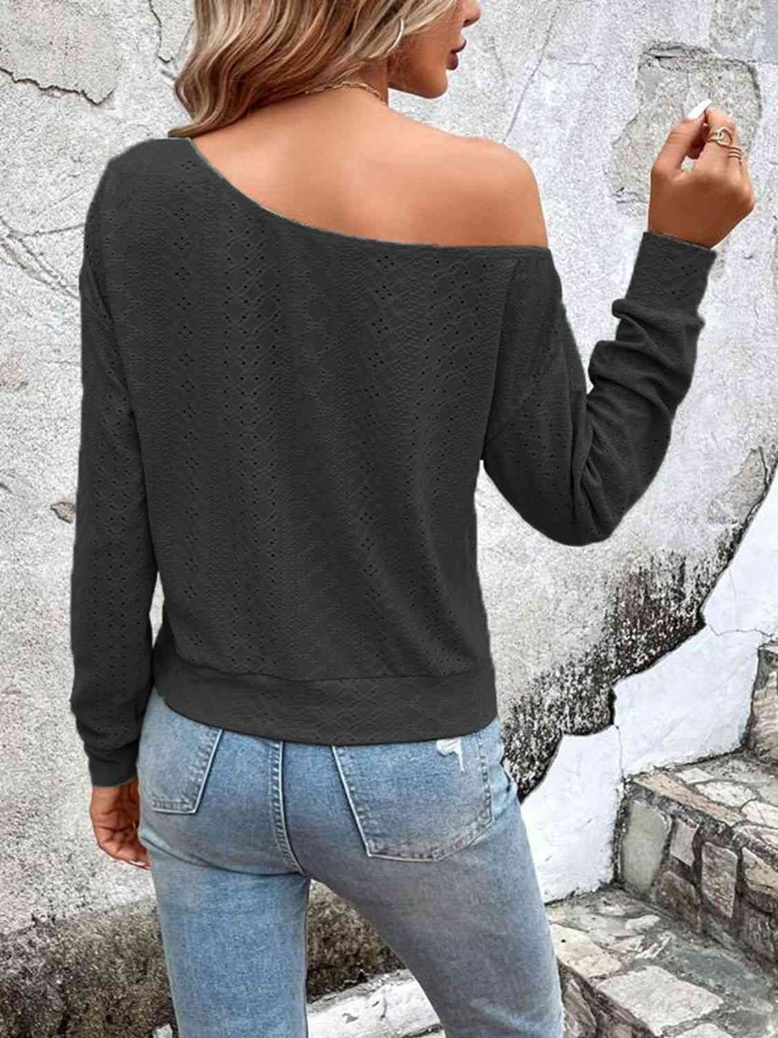 Eyelet dropped shoulder blouse.