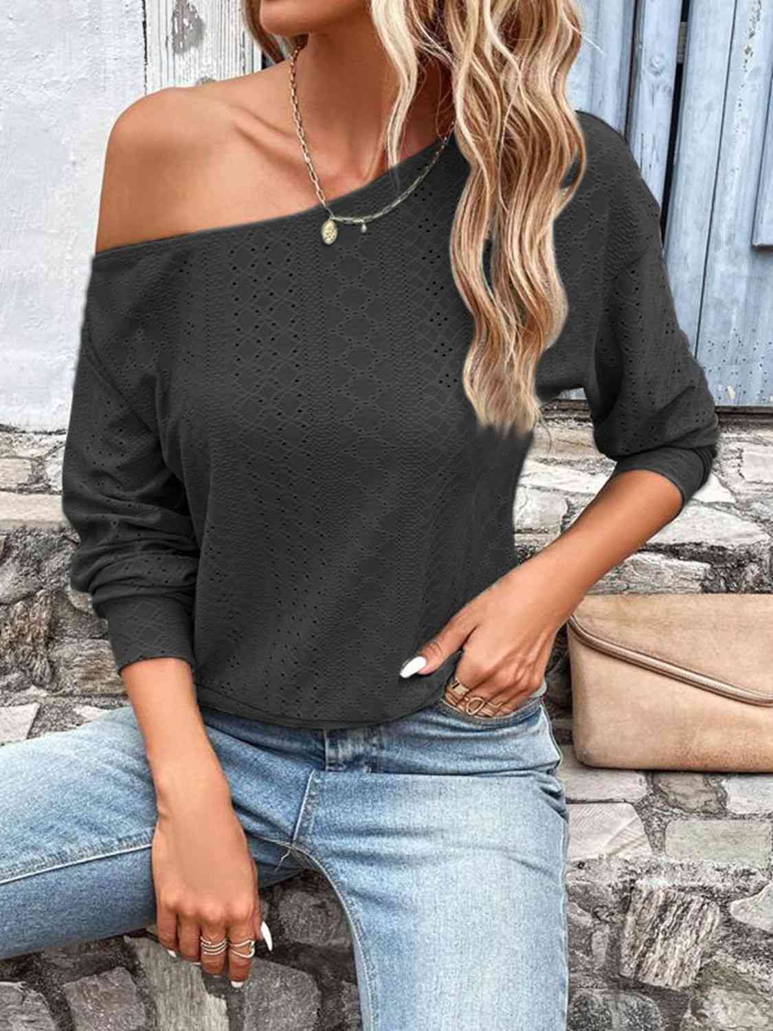 Eyelet dropped shoulder blouse.