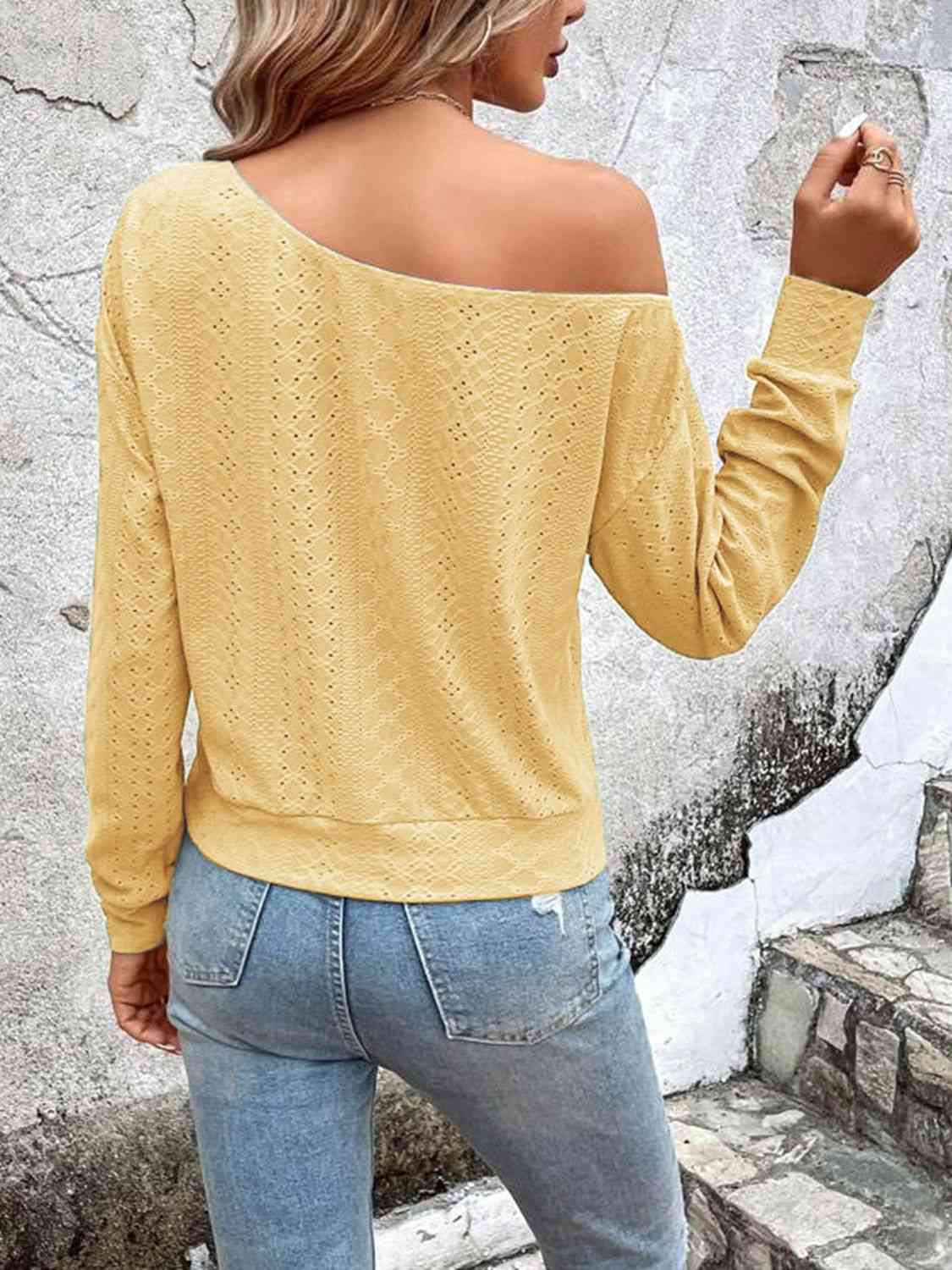 Eyelet dropped shoulder blouse.