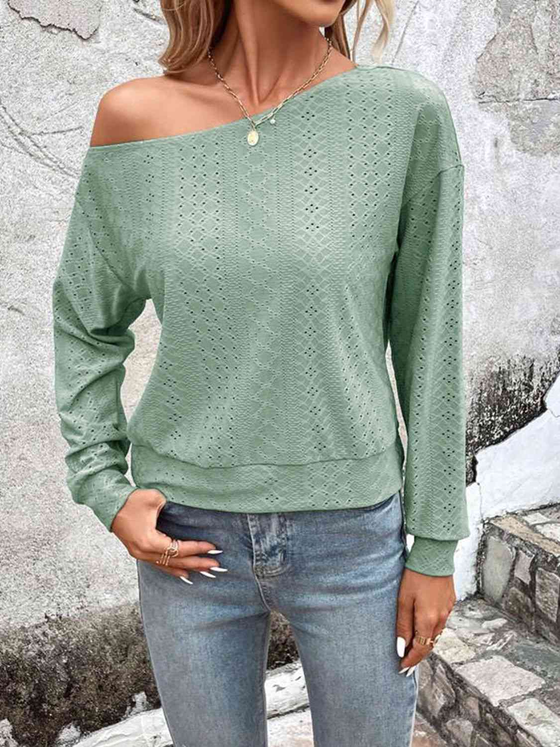 Eyelet dropped shoulder blouse.