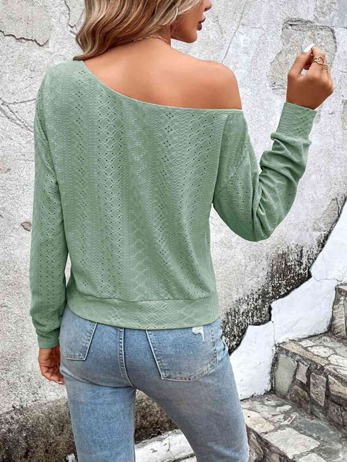 Eyelet dropped shoulder blouse.